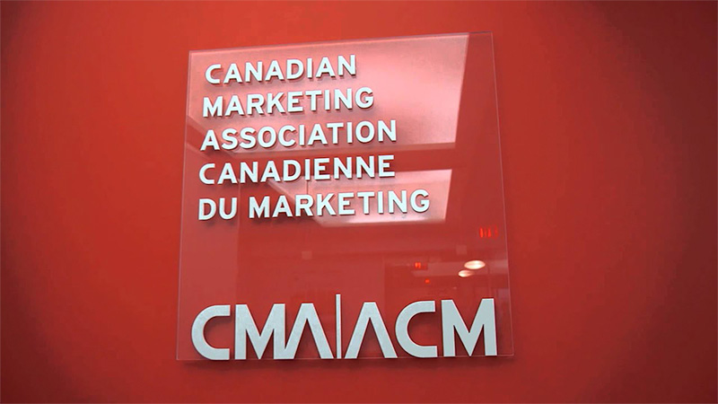 Logo of CMA on wall